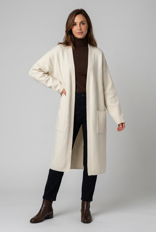 alva-lang-stickad-cardigan-med-fickor-aprikos - Dammode [product_title] [variant_title] dam basplagg