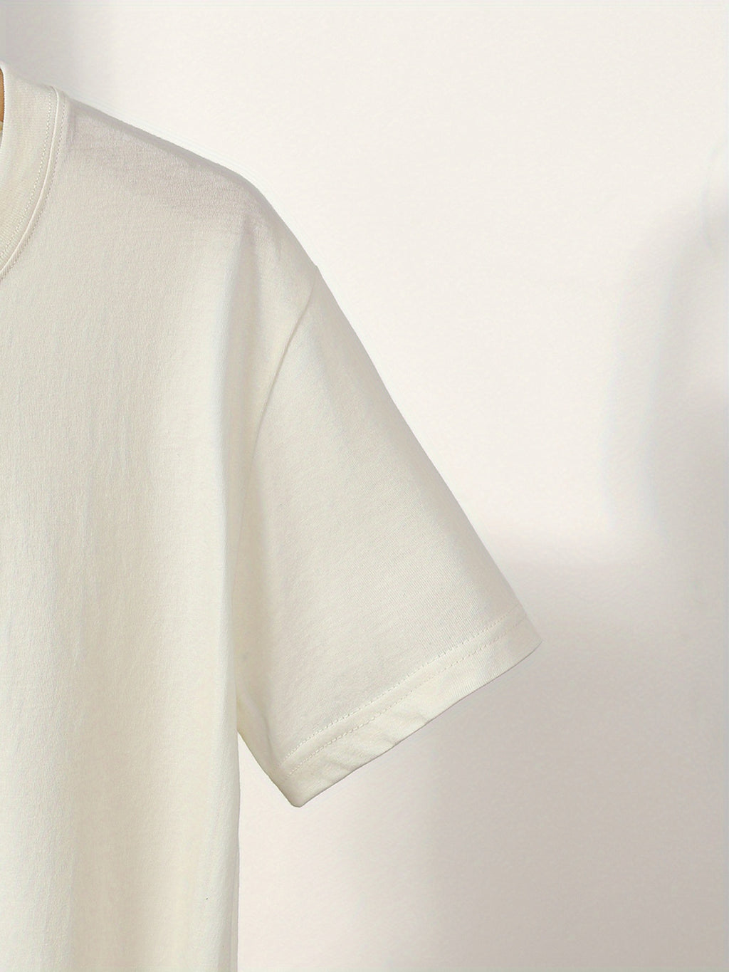 White t-shirt on a light gray background