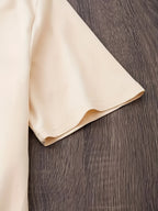 Beige fabric on a wooden surface
