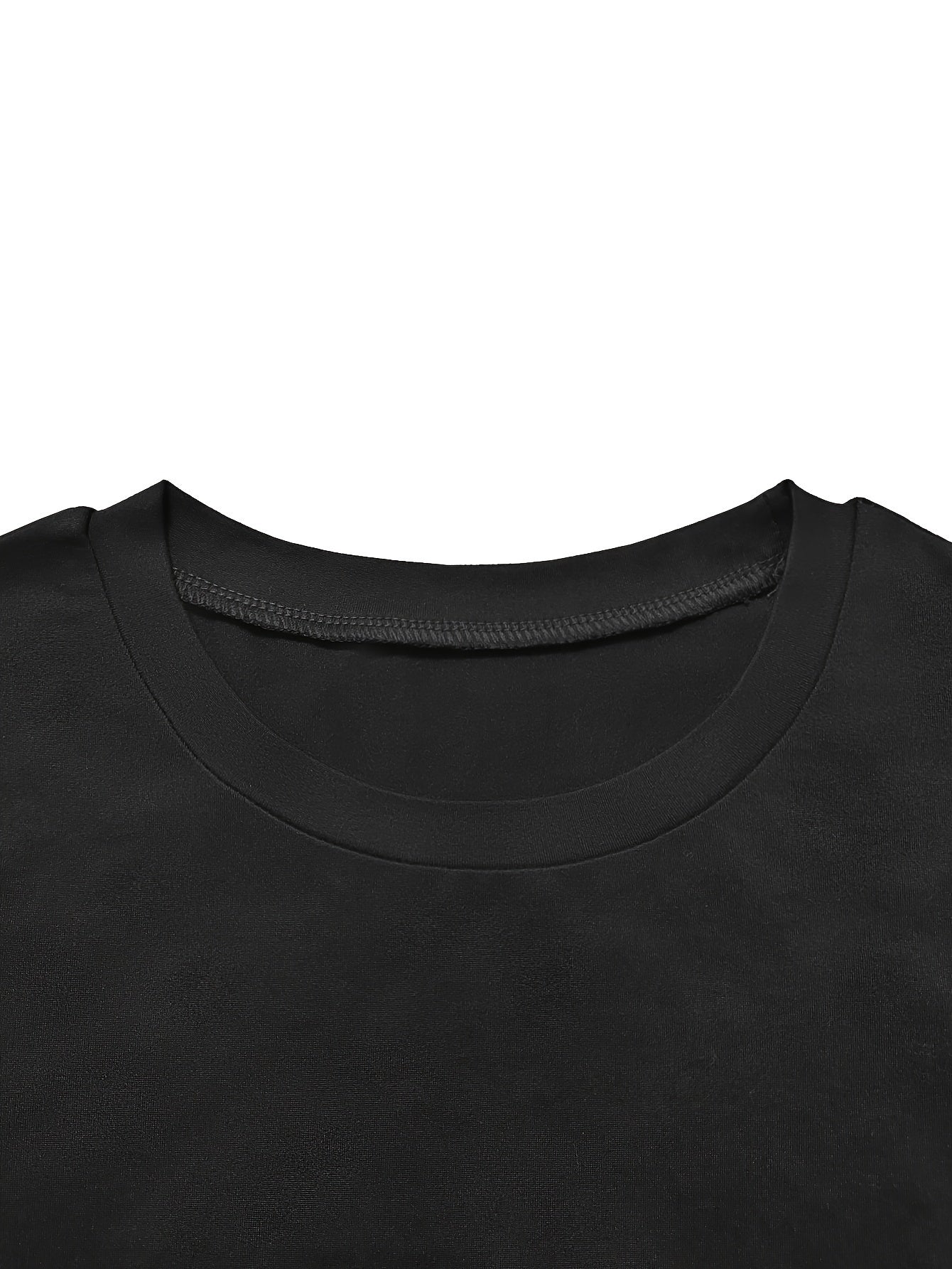 Close-up of a black shirt collar on a white background