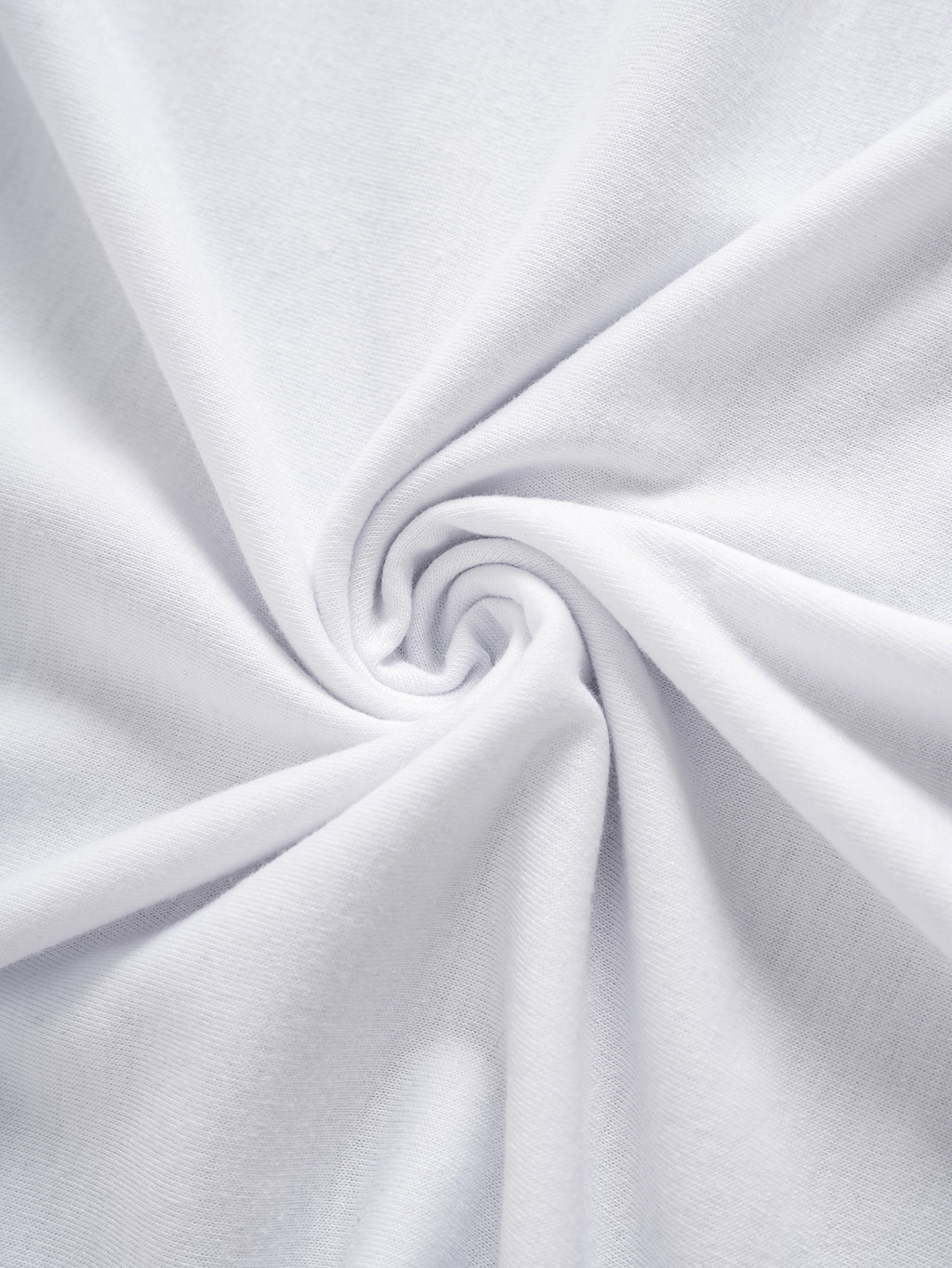 Close-up of white fabric with a swirl pattern