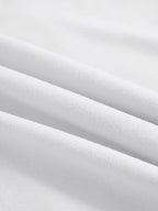 Close-up of white fabric with folds